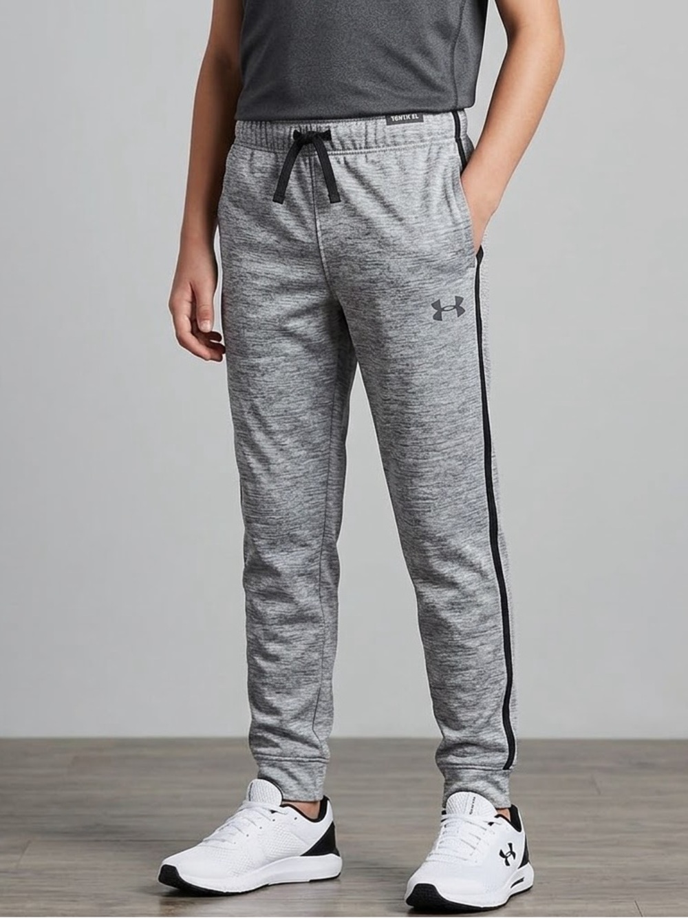 Youth Large Under Armour Heather Gray Joggers with Black Side Stripes